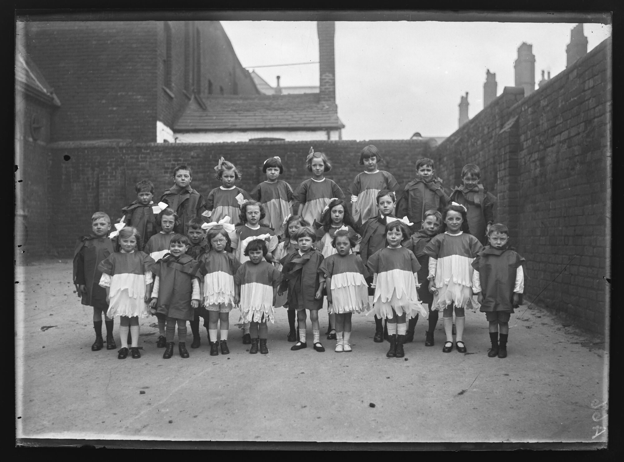 Pupils of Harley Street Wesleyan Primary School in playground, Barrow-in-Furness